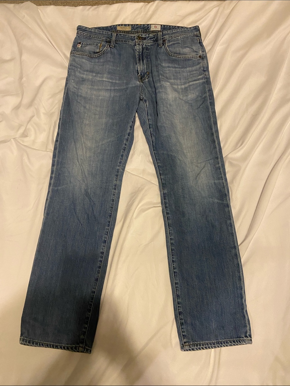 AG Adriano Goldschmied Men’s Straight Jeans in Faded Blue Denim The Graduate